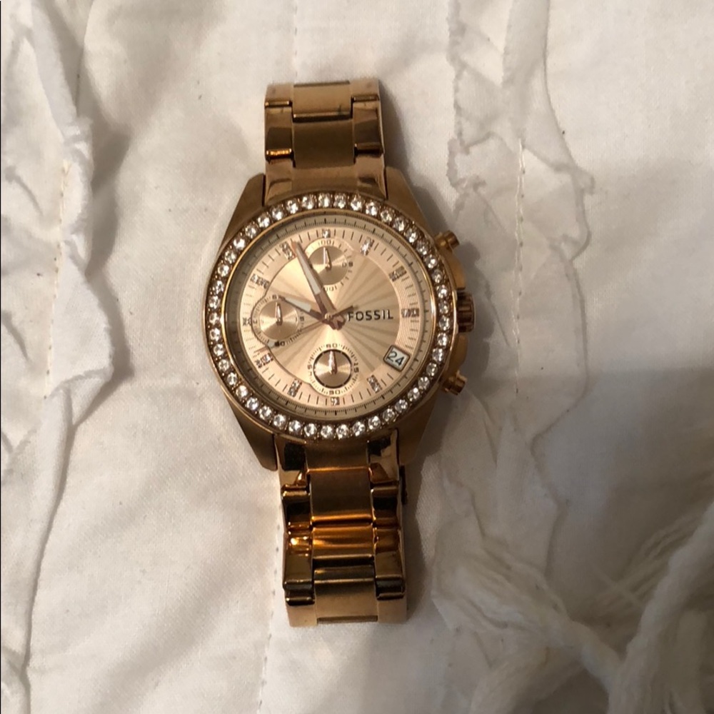 Rose gold fossil watch.